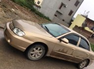 Kia Spectra   2004 - Cần bán lại xe Kia Spectra năm sản xuất 2004, màu vàng giá 105 triệu tại Thái Nguyên