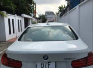 BMW 3 Series  320i  2014 - Bán BMW 320i 2014, màu trắng, xe nhập, chính chủ giá 930 triệu tại Bình Dương