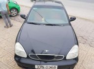 Daewoo Nubira 2002 - Cần bán gấp Daewoo Nubira 2002, màu đen, nhập khẩu nguyên chiếc, 82tr giá 82 triệu tại Hà Tĩnh