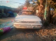 Nissan Bluebird 1990 - Bán Nissan Bluebird sản xuất năm 1990, màu vàng giá 45 triệu tại Cần Thơ