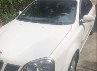 Daewoo Lacetti  MT 2004 - Bán ô tô Daewoo Lacetti MT sản xuất năm 2004, màu trắng, nội thất zin nguyên bản giá 170 triệu tại Bình Dương