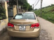 Chevrolet Cruze LS 2010 - Bán xe Chevrolet Cruze LS sản xuất 2010, màu vàng số sàn giá 295 triệu tại Hà Nội