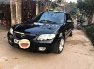 Mazda 323 2002 - Bán Mazda 323 đời 2002, màu đen, nhập khẩu   giá 180 triệu tại Quảng Trị