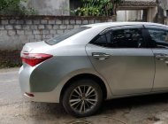 Toyota Corolla altis 1.8G 2015 - Cần bán Toyota Corolla Altis 1.8G đời 2015, màu bạc   giá 595 triệu tại Nam Định