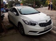 Kia K3 MT 2014 - Cần bán Kia K3 MT 2014, màu trắng giá 415 triệu tại Hà Nội