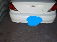 Kia Spectra 2003 - Bán Kia Spectra sản xuất năm 2003, màu trắng, nhập khẩu giá 100 triệu tại Trà Vinh