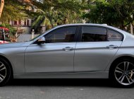 BMW 3 Series 320I 2014 - Bán BMW 320i Sportline 2014 màu bạc chính chủ giá 828 triệu tại Tp.HCM