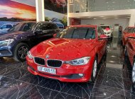 BMW 3 Series 320i  2014 - BMW 3 Series 320i đời 2014 màu đỏ, nội thất kem giá 875 triệu tại Hà Nội