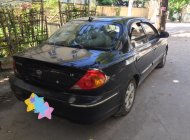 Kia Spectra 2003 - Cần bán Kia Spectra đời 2003, màu đen giá 105 triệu tại Hòa Bình