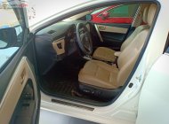 Toyota Corolla altis 1.8G 2015 - Cần bán lại xe Toyota Corolla altis 1.8G đời 2015, màu trắng giá 640 triệu tại Khánh Hòa