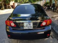 Toyota Corolla altis G 2010 - Cần bán lại xe Toyota Corolla altis G đời 2010, màu đen giá 385 triệu tại Nghệ An