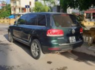 Volkswagen Touareg 2004 - Cần bán Volkswagen Touareg đời 2004, màu xanh lam, xe nhập, đăng ký lần đầu 2008 giá 480 triệu tại Hà Nội