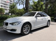 BMW 3 Series 320i 2014 - Bán BMW 320i sản xuất năm 2014, màu trắng, xe nhập giá 879 triệu tại Nghệ An