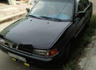 Mazda 323   1995 - Bán xe Mazda 323 đời 1995, màu đen, nhập khẩu giá 70 triệu tại Bình Định