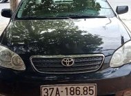 Toyota Corolla altis 2004 - Gia đình bán Toyota Corolla altis sản xuất năm 2004, màu đen giá 230 triệu tại Nghệ An