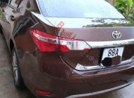 Toyota Corolla altis 1.8G AT  2015 - Chính chủ bán xe Toyota Corolla altis 1.8G AT năm sản xuất 2015, màu nâu giá 620 triệu tại Vĩnh Phúc