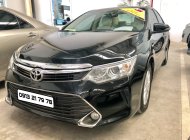 Toyota Camry E 2015 - Cần bán gấp Toyota Camry E đời 2015, màu đen giá 820 triệu tại Tp.HCM