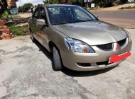 Mitsubishi Lancer 2004 - Bán Mitsubishi Lancer đời 2004, màu vàng, xe nhập xe gia đình giá 175 triệu tại Gia Lai