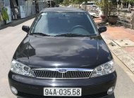 Ford Laser   2002 - Bán Ford Laser năm 2002, màu đen, xe nhập giá 180 triệu tại Bạc Liêu