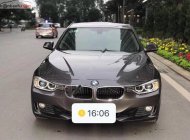 BMW 3 Series 320i 2012 - Cần bán lại xe BMW 3 Series 320i đời 2012, màu nâu, nhập khẩu nguyên chiếc   giá 768 triệu tại Tp.HCM