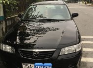 Mazda 626 2001 - Bán ô tô Mazda 626 năm 2001, màu đen còn mới giá tốt 155 triệu đồng giá 155 triệu tại TT - Huế