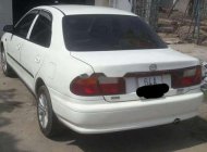 Mazda 323   1999 - Bán Mazda 323 1999, màu trắng, xe gia đình giá 90 triệu tại Trà Vinh