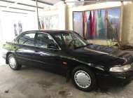 Mazda 626 1996 - Cần bán Mazda 626 sản xuất 1996, màu đen xe gia đình, 70 triệu giá 70 triệu tại TT - Huế