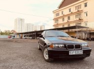 BMW 3 Series 320i 1995 - Bán BMW 320i sản xuất 1995, màu đen, nhập khẩu giá 120 triệu tại Tp.HCM