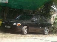 Mazda 323 1.6 MT 1997 - Cần bán xe Mazda 323 1.6 MT đời 1997, màu đen, xe nhập giá 68 triệu tại TT - Huế