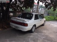 Mazda 323 1995 - Bán xe Mazda 323 sản xuất 1995, màu trắng giá 50 triệu tại Tuyên Quang