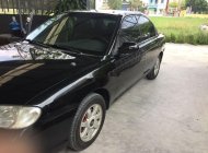 Kia Spectra 2003 - Cần bán lại xe Kia Spectra sản xuất 2003, màu đen, xe nhập chính chủ giá 95 triệu tại Hải Dương