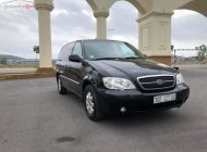 Kia Carnival 2.4 2009 - Bán Kia Carnival 2.4 sản xuất năm 2009, màu đen xe gia đình, 245tr giá 245 triệu tại Hải Dương