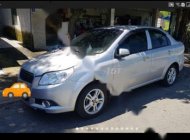 Chevrolet Aveo 2015 - Cần bán lại xe Chevrolet Aveo năm sản xuất 2015, màu bạc xe còn mới nguyên giá 245 triệu tại Trà Vinh