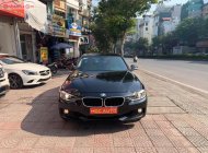 BMW 3 Series 320i 2012 - Cần bán gấp BMW 3 Series 320i sản xuất năm 2012, màu đen, xe nhập, giá tốt giá 730 triệu tại Hà Nội