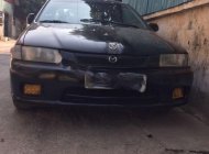 Mazda 323 1997 - Cần bán gấp Mazda 323 năm sản xuất 1997, màu đen, xe nhập chính hãng giá 69 triệu tại Hòa Bình