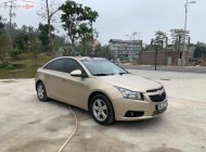 Chevrolet Cruze LS 1.6 MT 2013 - Cần bán xe Chevrolet Cruze LS 1.6 MT đời 2013, màu vàng chính chủ giá 295 triệu tại Hòa Bình