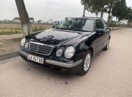 Mercedes-Benz E class 2001 - Cần bán gấp Mercedes sản xuất 2001, màu đen, giá tốt giá 165 triệu tại Hà Nội