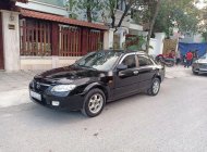 Mazda 323 2005 - Cần bán Mazda 323 đời 2005, màu đen, nhập khẩu nguyên chiếc, giá chỉ 125 triệu giá 125 triệu tại Hà Nội