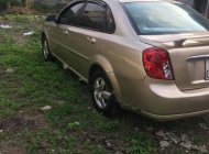 Chevrolet Lacetti   2012 - Bán Chevrolet Lacetti 1.6 đời 2012, màu vàng giá 196 triệu tại Ninh Bình