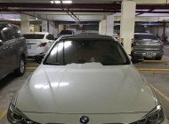 BMW 3 Series  320i  2013 - Bán BMW 3 Series 320i năm 2013, màu trắng, xe nhập chính chủ giá 800 triệu tại Tp.HCM