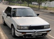 Nissan Bluebird 1.8   1990 - Cần bán Nissan Bluebird 1.8 đời 1990, màu trắng, xe nhập số sàn giá 18 triệu tại Tp.HCM