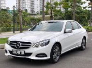 Mercedes-Benz E class E250 2014 - Chính chủ bán Mer E250 Sunroof trắng Ngọc Trinh 2014 giá 1 tỷ 180 tr tại Tp.HCM