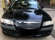 Mazda 626 2001 - Cần bán lại xe Mazda 626 đời 2001, màu đen số sàn giá cạnh tranh giá 184 triệu tại Ninh Bình