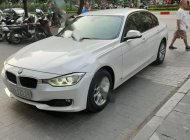 BMW 3 Series 2012 - Bán BMW 3 Series 320i năm sản xuất 2012, màu trắng, xe nhập giá cạnh tranh giá 650 triệu tại Hà Nội