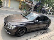 Cần bán lại xe BMW 3 Series sản xuất 2014, màu nâu, nhập khẩu, giá chỉ 835 triệu giá 835 triệu tại Tp.HCM