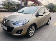 Mazda 2 2014 - Bán xe Mazda 2 đời 2014, màu vàng giá 360 triệu tại Hà Tĩnh