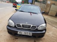 Daewoo Lanos 2001 - Cần bán Daewoo Lanos năm 2001, màu đen giá 52 triệu tại Nghệ An