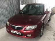 Mazda 323   2002 - Bán Mazda 323 đời 2002, màu đỏ giá 135 triệu tại Đồng Tháp