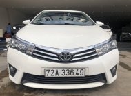 Toyota Corolla 2015 - Cần bán gấp Toyota Corolla sản xuất năm 2015, màu trắng số tự động, 570 triệu giá 570 triệu tại Hà Nội