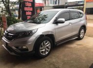 Honda CR V 2015 - Cần bán lại xe Honda CR V 2.0 AT sản xuất năm 2015, màu bạc số tự động, giá chỉ 655 triệu giá 655 triệu tại Nghệ An